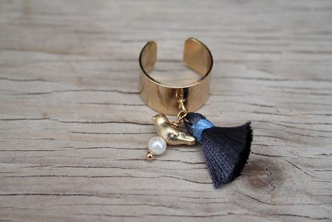 anello,uccellino,perla,e,nappina,blu