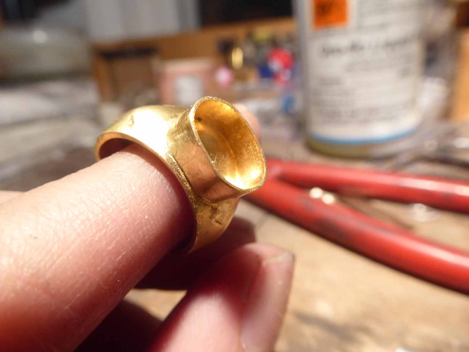 handcrafting a bespoke Roman inspired 22ct gold ring in Catherine Marche custome engagement rings workshop in London